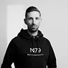 Portrait of Stefan Wagner wearing a black hoodie against a neutral background, reflecting his focus on practical CTO coaching.